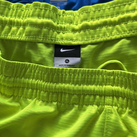 3 pairs of Nike shorts one purple one blue cut offe one flouresant yellow - Picture 5 of 9